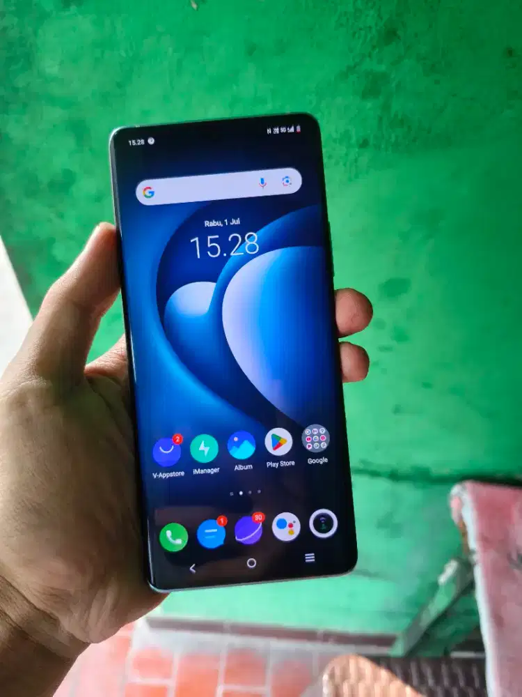 Vivo X60 pro 5G.  12+8/256gb