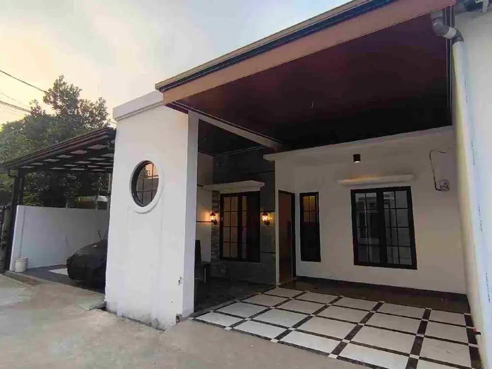 RUMAH NEMPEL JALAN RAYA DEKAT STASIUN