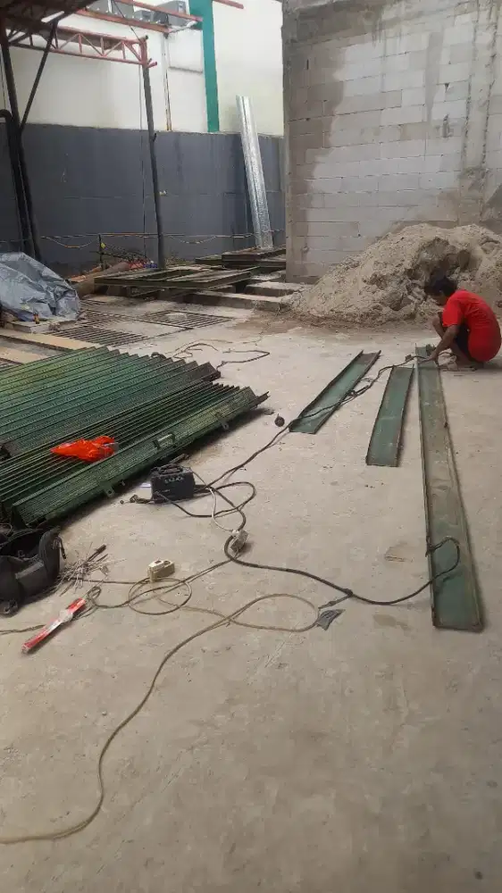 Tukang service rolling door folding gate murah