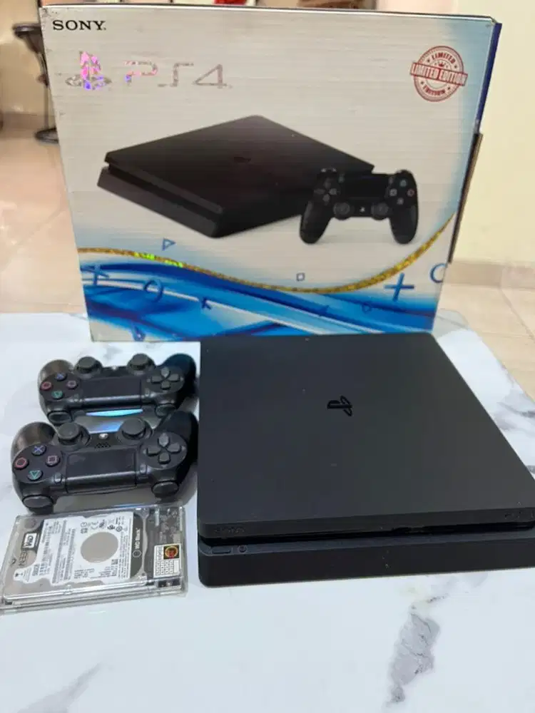 PS4 Slim 500 GB + Hard disk 500 GB +2 stick + HDMI cable