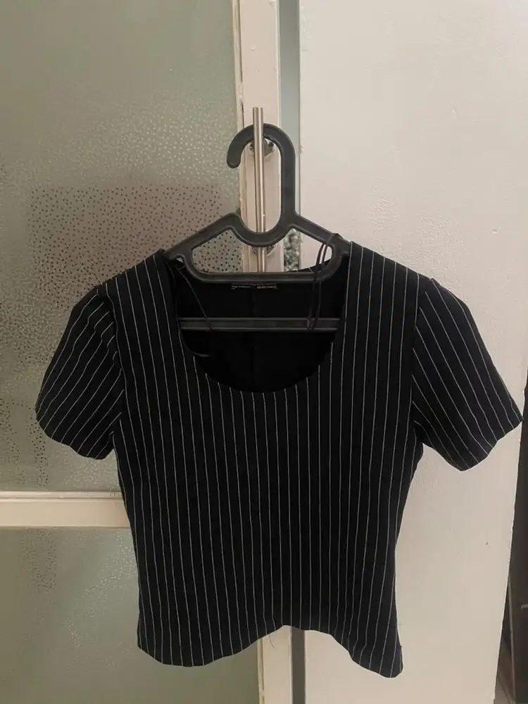 Aneka baju dan celana