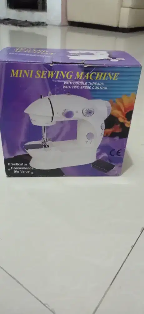 Mesin jahit mini portable