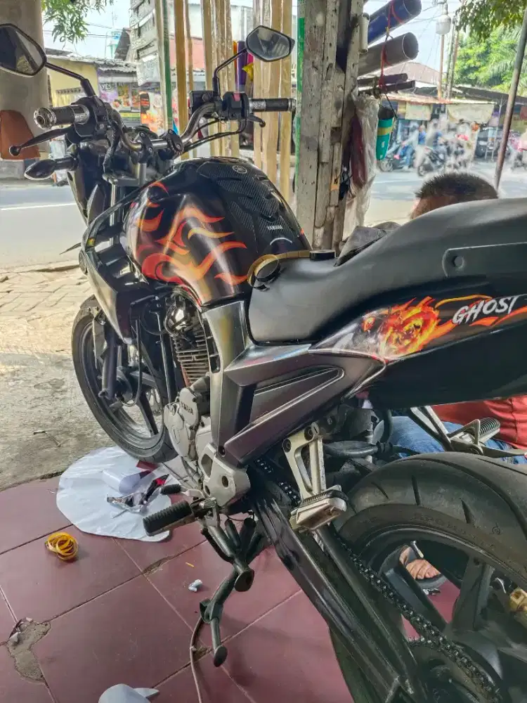 SCORPIO  2012 ban lebar