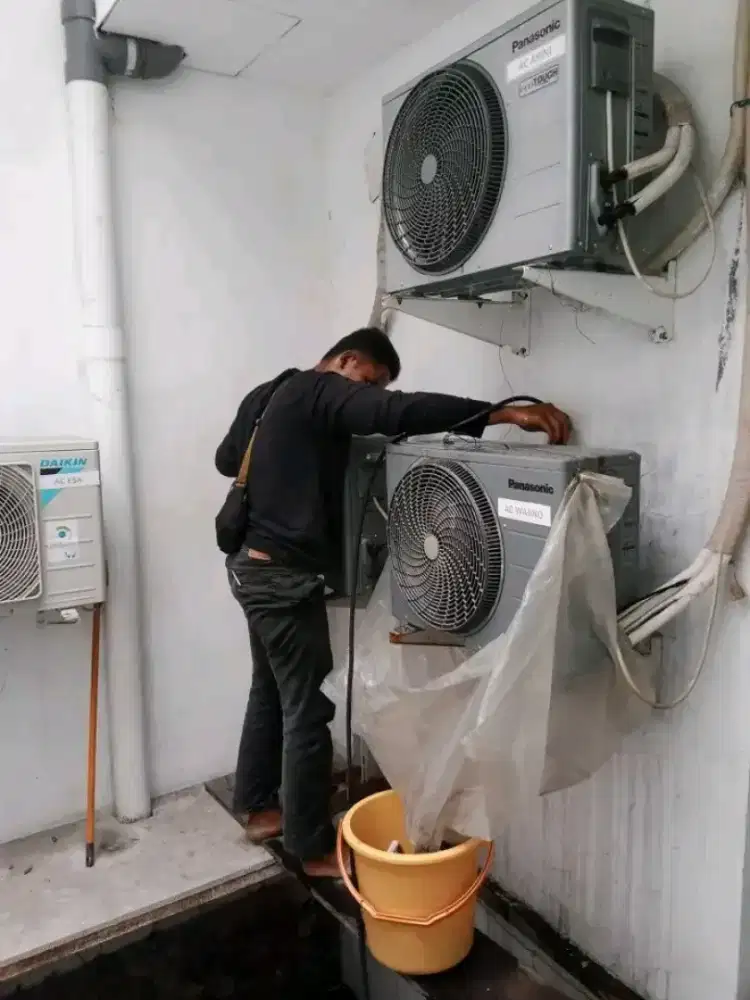 Service AC bongkar pasang AC