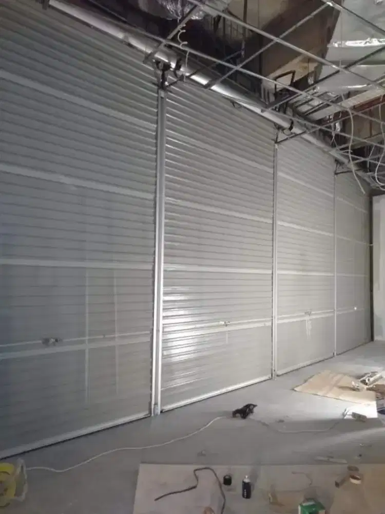 Tukang perbaikan rolling door folding gate termurah