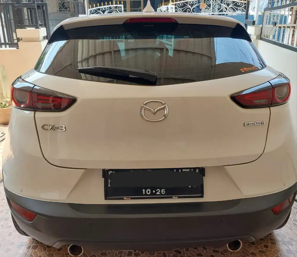 Mazda CX-3 (2021) warna Putih.