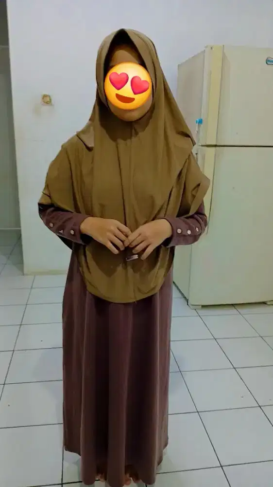 Sepakat baju dan kerudung