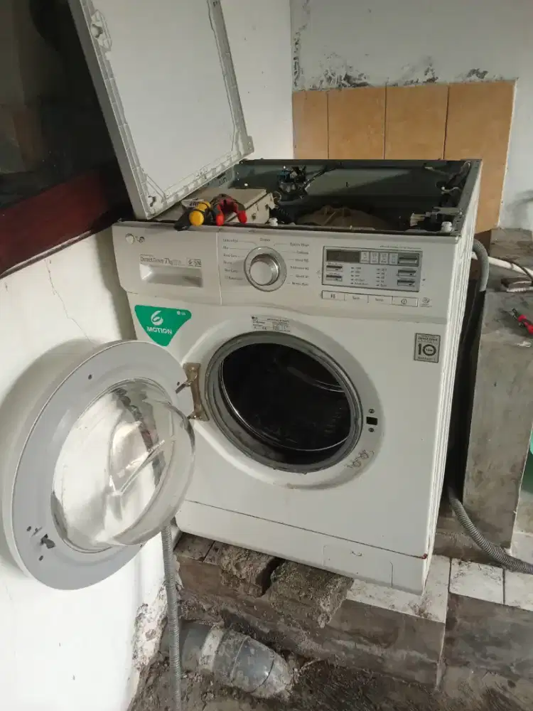 SERVICE MESIN CUCI