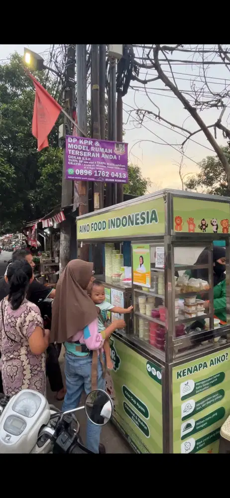 Penjaga Outlet Bubur Bayi