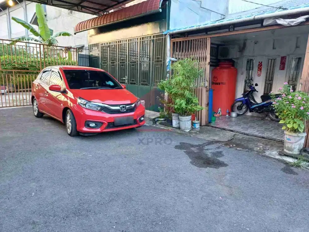 Dijual rumah berpagar bebas banjir siap huni kondisi bagus dengan akses jalan aspal luas beserta exclusive 12 bulan free AC 1 unit dan CCTV di Jl, 822, Komp. Hosana Fortuna