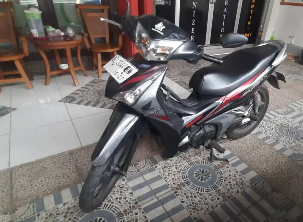 Supra X 125 injeksi helm ini