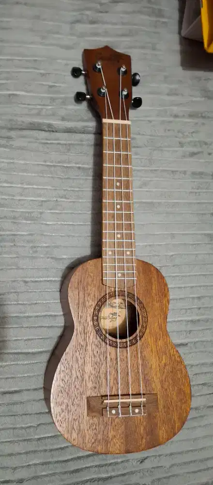 Ukulele light brown cowboy
