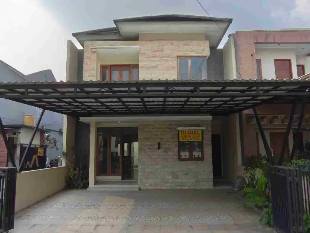 RUMAH BARU MODERN TROPICAL SIAP HUNI DALAM CLUSTER