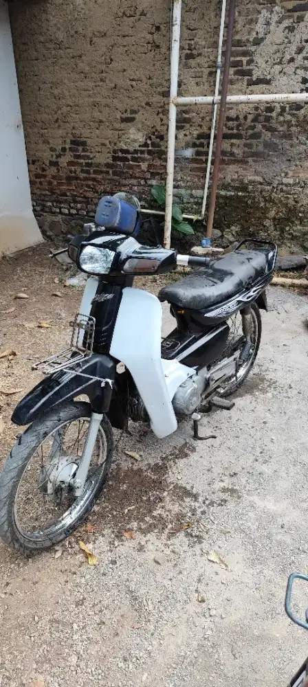 Astrea grand tahun 1995 sabit