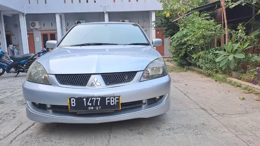 Mitsubishi lancer sei triptonik 2011 terawat siap pakai