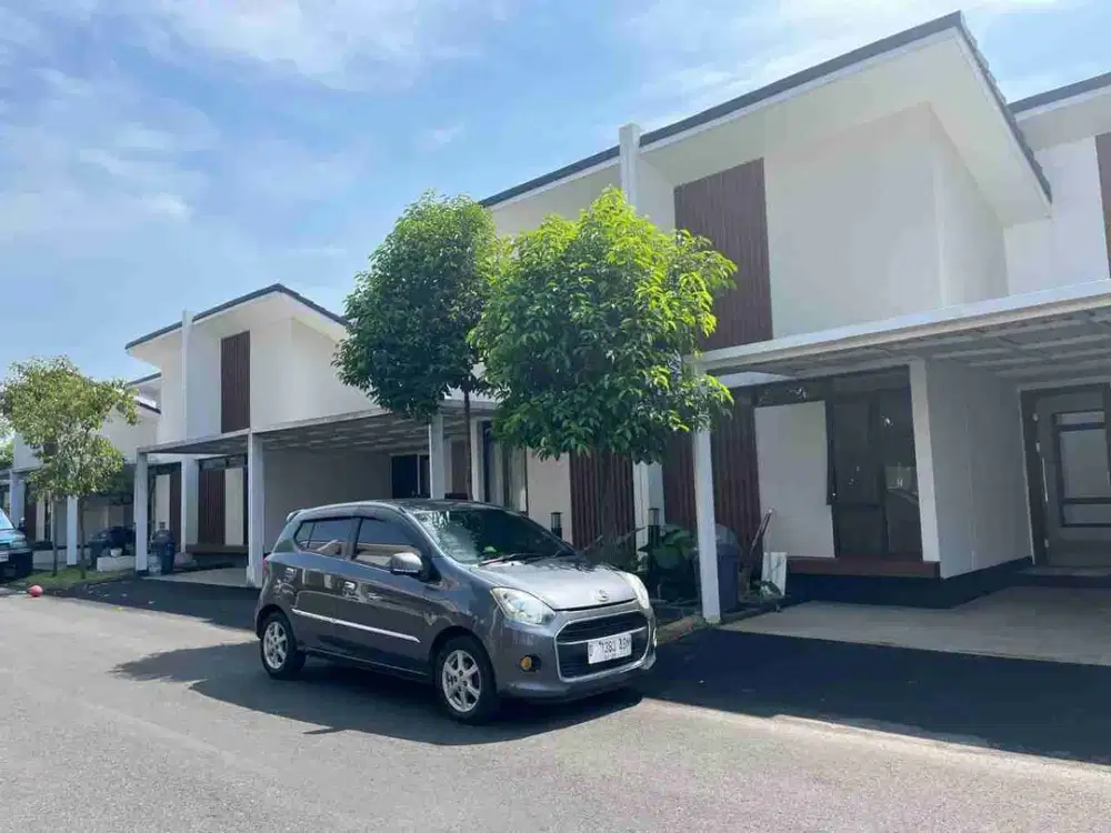 Rumah cakep cepat huni  semi furnish 2 lantai di Agung Podomoro sudah ada AC 1, water heater, gordyn