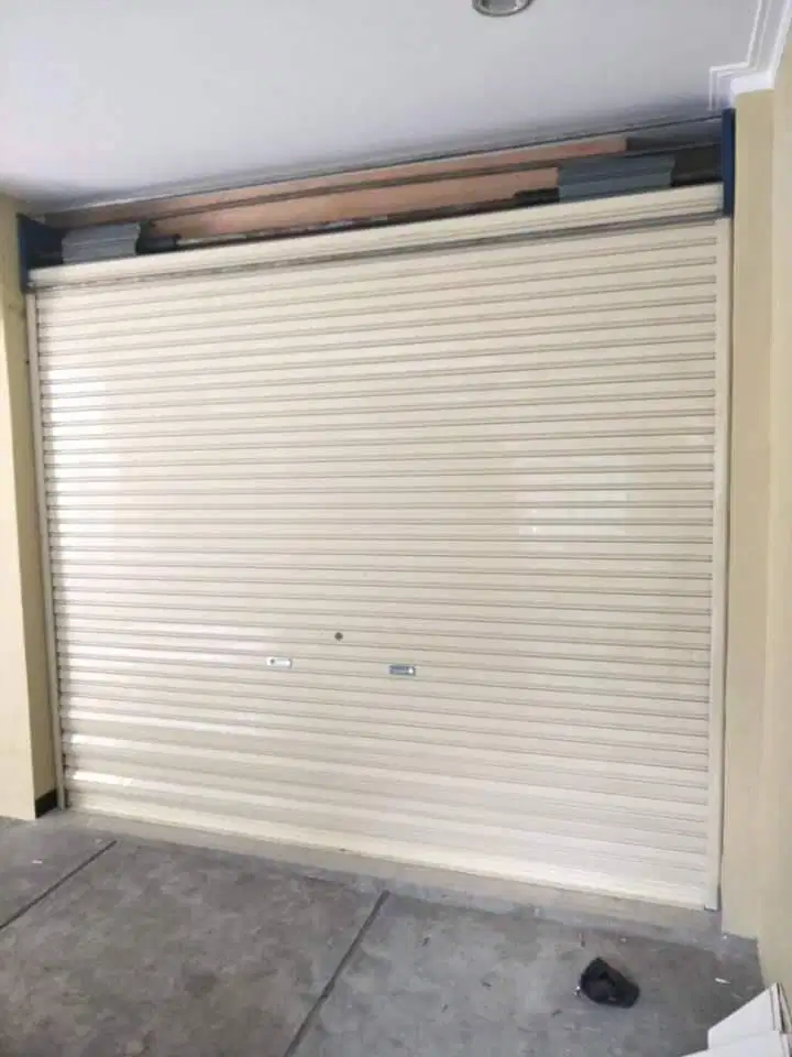 Menerima service Rolling door