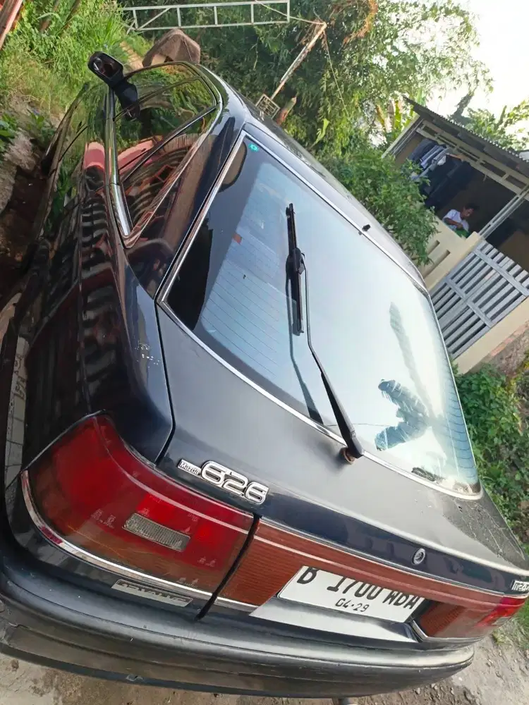 Jual santai mobil sedan mazda capella 626 tahun 1989