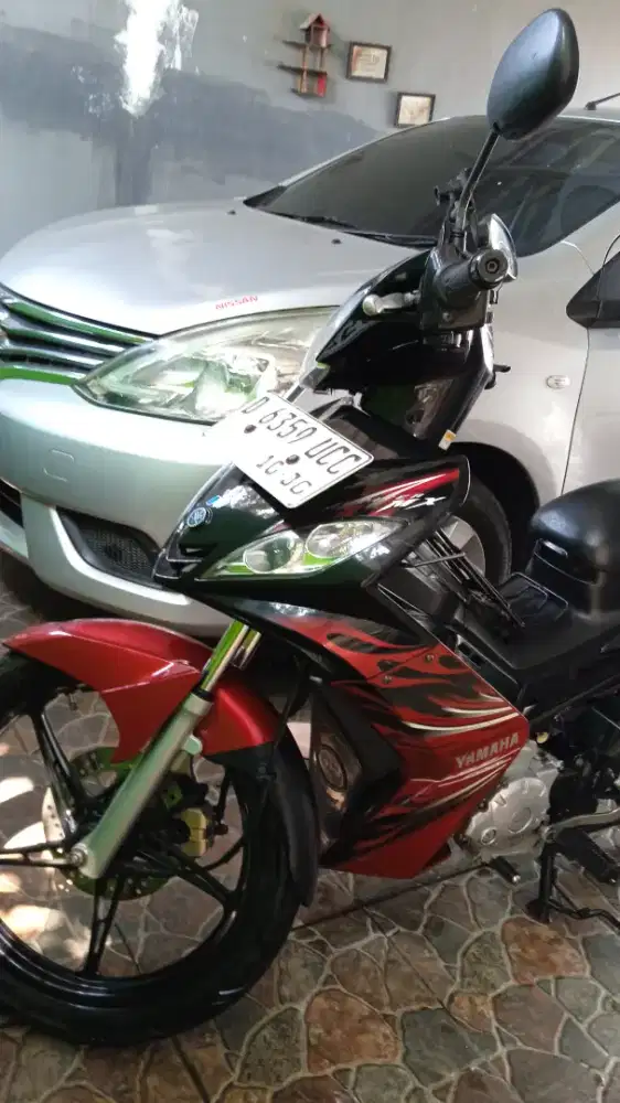 Jupiter MX warna hideung poket merah