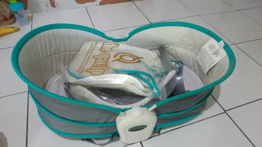 Tempat tidur bayi ayunan