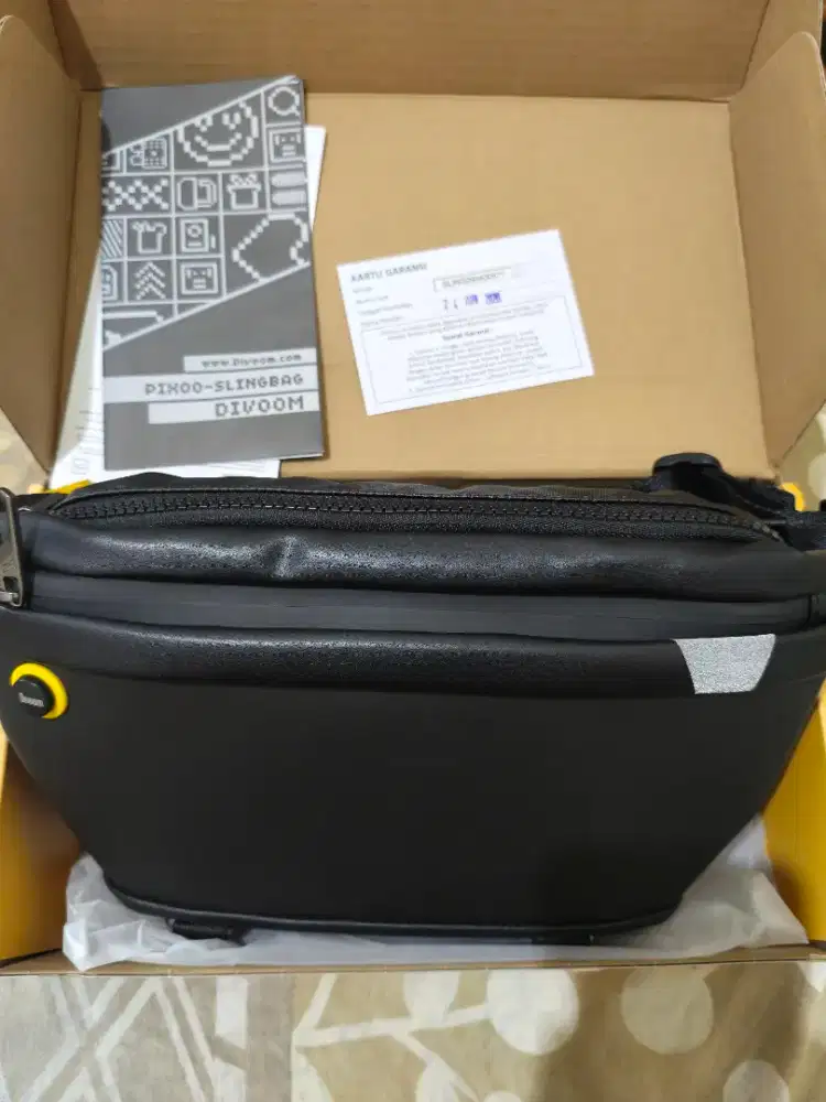 tas divom masih baru