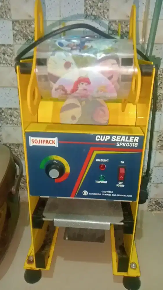 Mesin press minuman