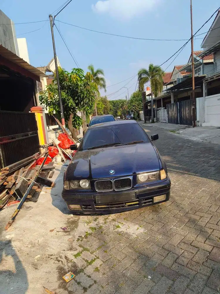 BMW 318i 1997 Bensin