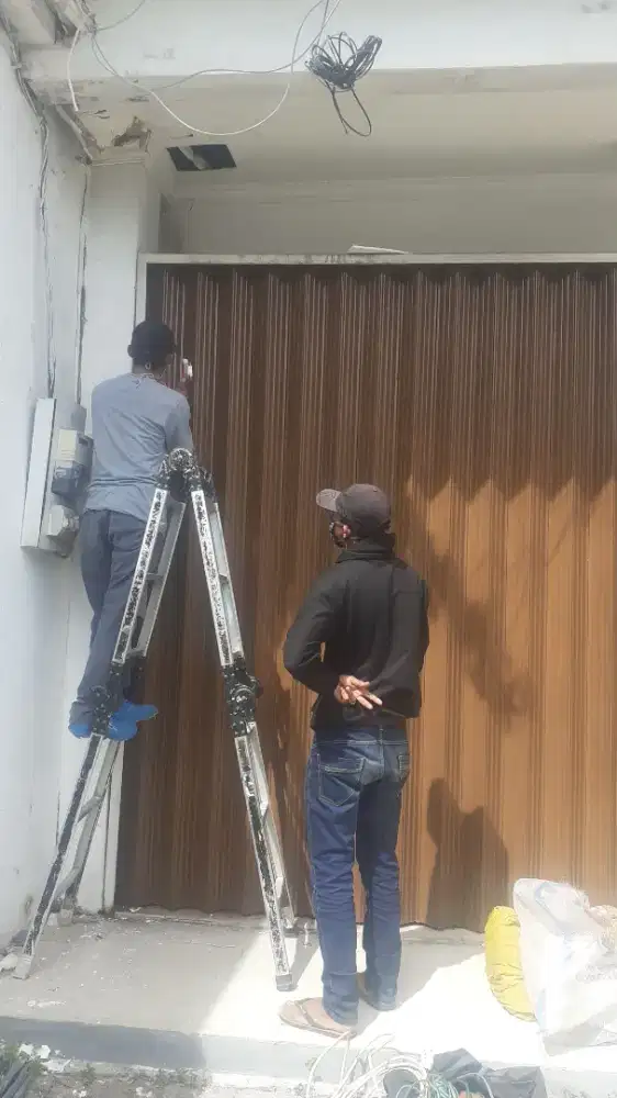 Tukang spesialis service rolling door folding gate 24 jam