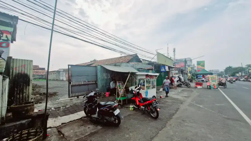 Dijual tanah kosong plus bangunan toko dan kontrakan