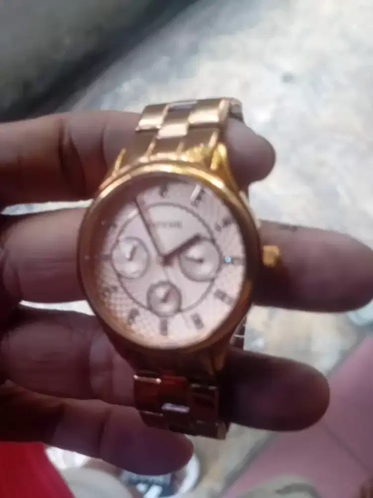 Jam wanita fosil rose gold
