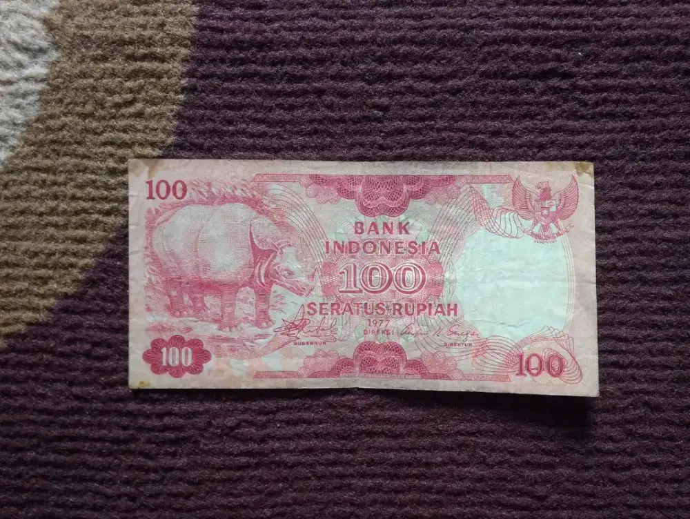 Uang Kertas 100 Badak & 500 Bunga Bangkai