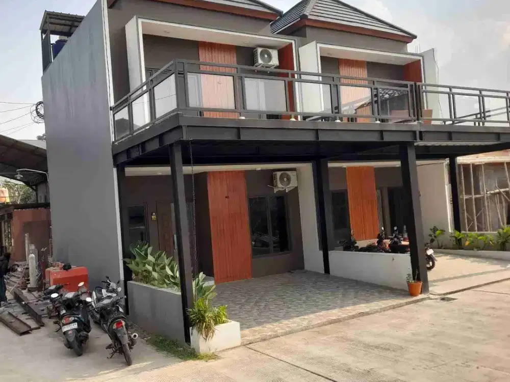 Townhouse mewah pinggir jalan raya jatiwarna cuma 900juta an