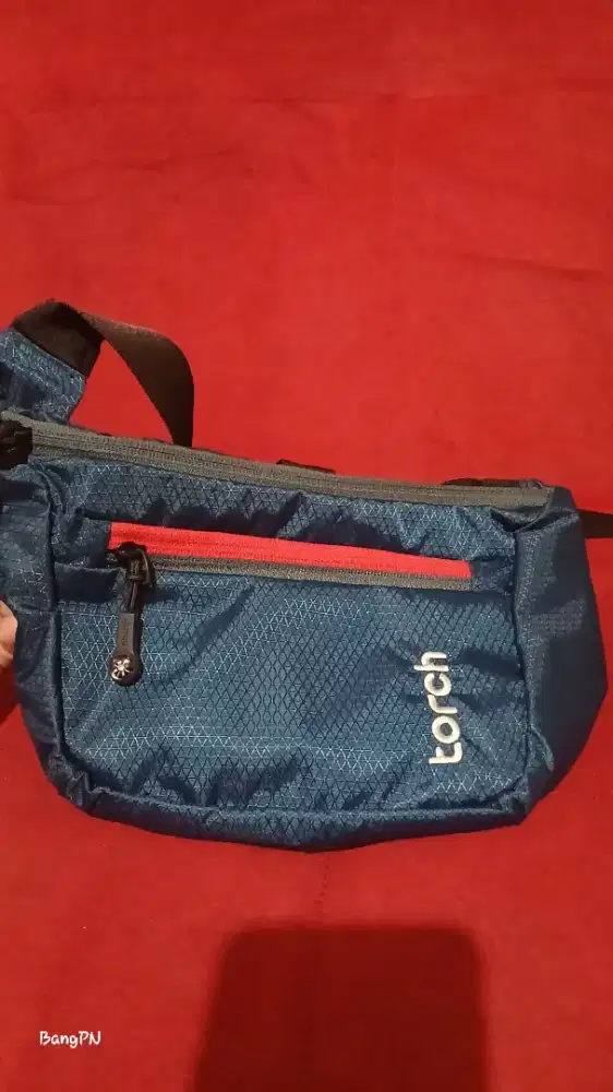 Tas slempang Torch