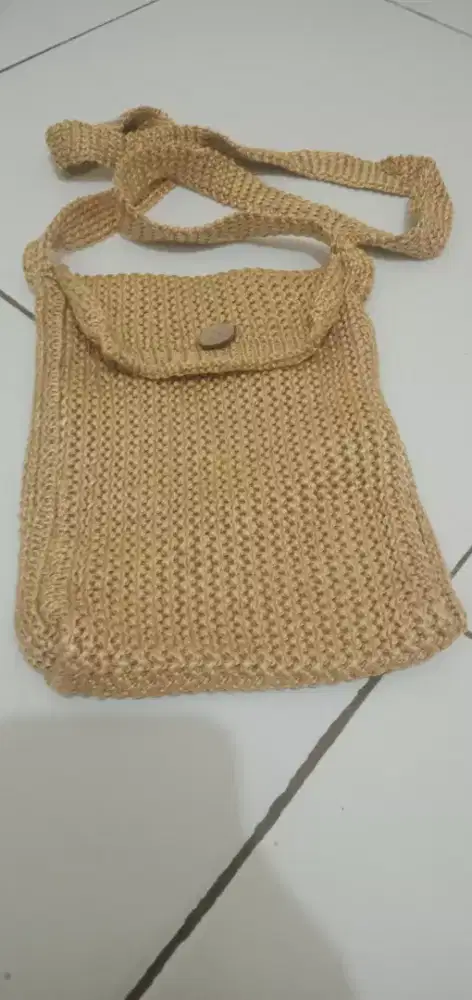 TAS BAGUS GOLD EMAS DARI PAPUA SANA