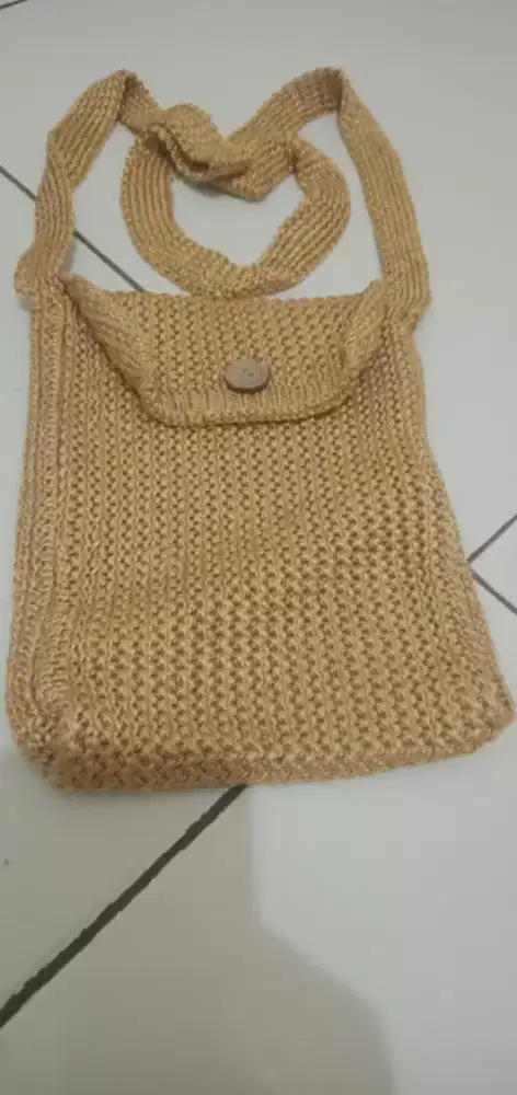 TAS BAGUS GOLD EMAS DARI PAPUA SANA.