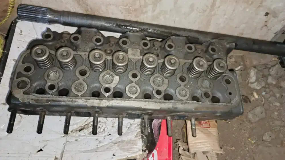 Cylinder head/deksel copotan canter 125 original