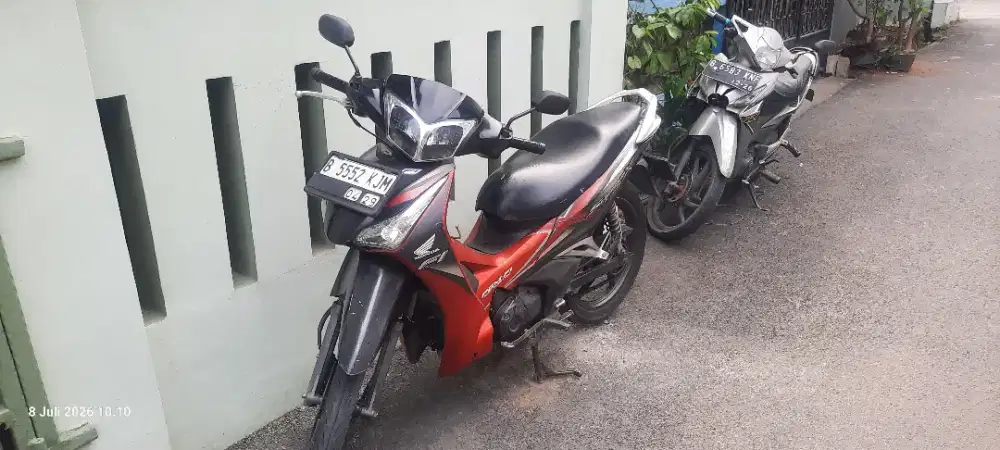 Honda Supra X Helm In 2013 Warna Merah Hitam