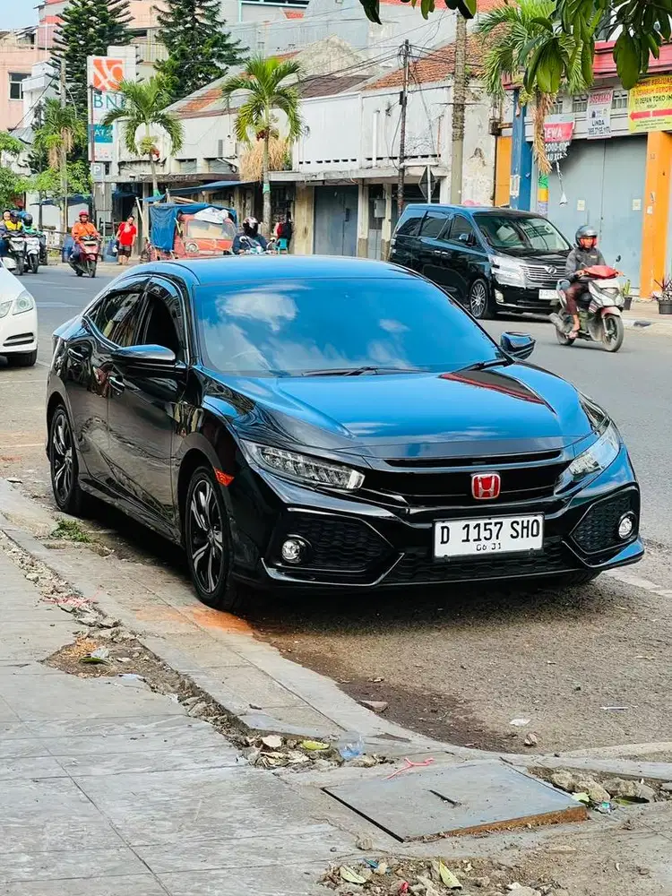 Honda civic turbo hatchback E at 2019 km 27rb hitam