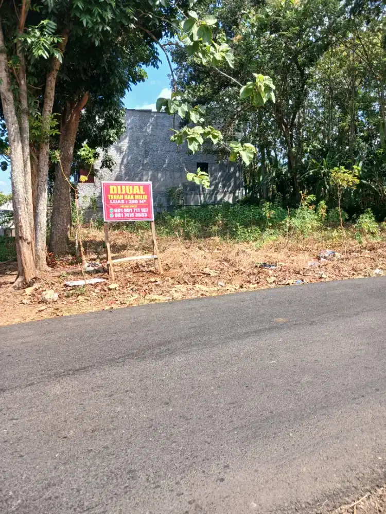 Dijual tnh HM pinggir jl raya