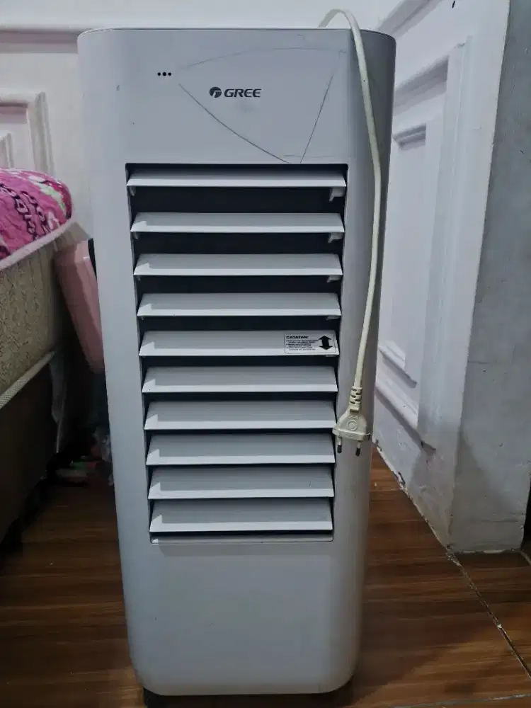 AC duduk merek gree