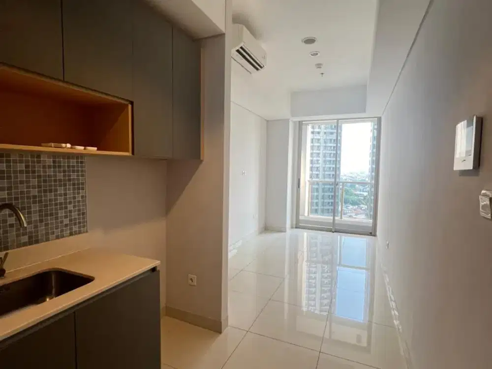 disewakan 2 bedroom semi furnish taman anggrek residence