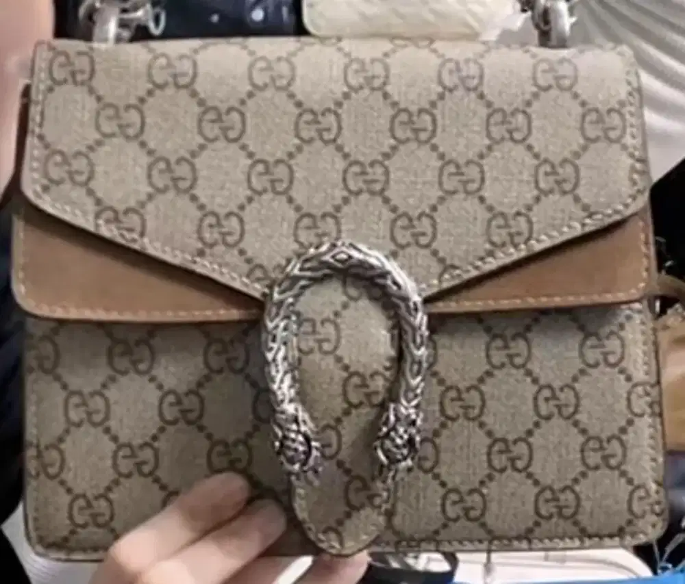 Tas Guccong Naga