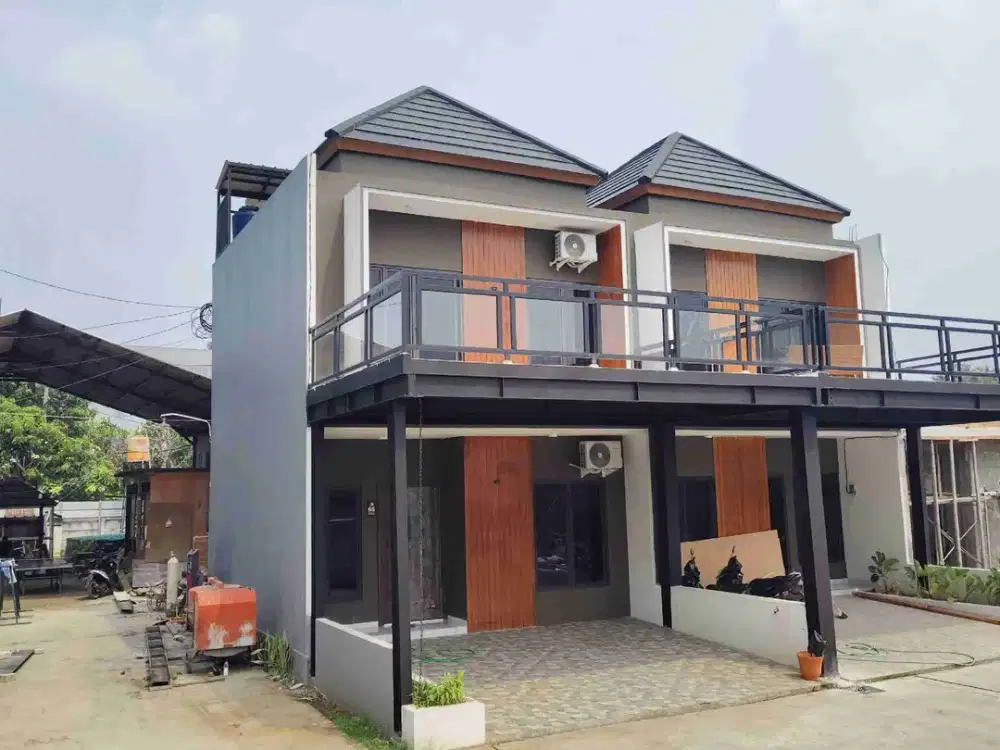 Cluster dijual type 2lantai lokasi pinggir jalan raya utama kampung sawah cuma 5menit ke tol Jatiwarna