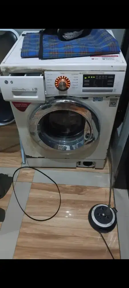 MESIN CUCI MEREK LG