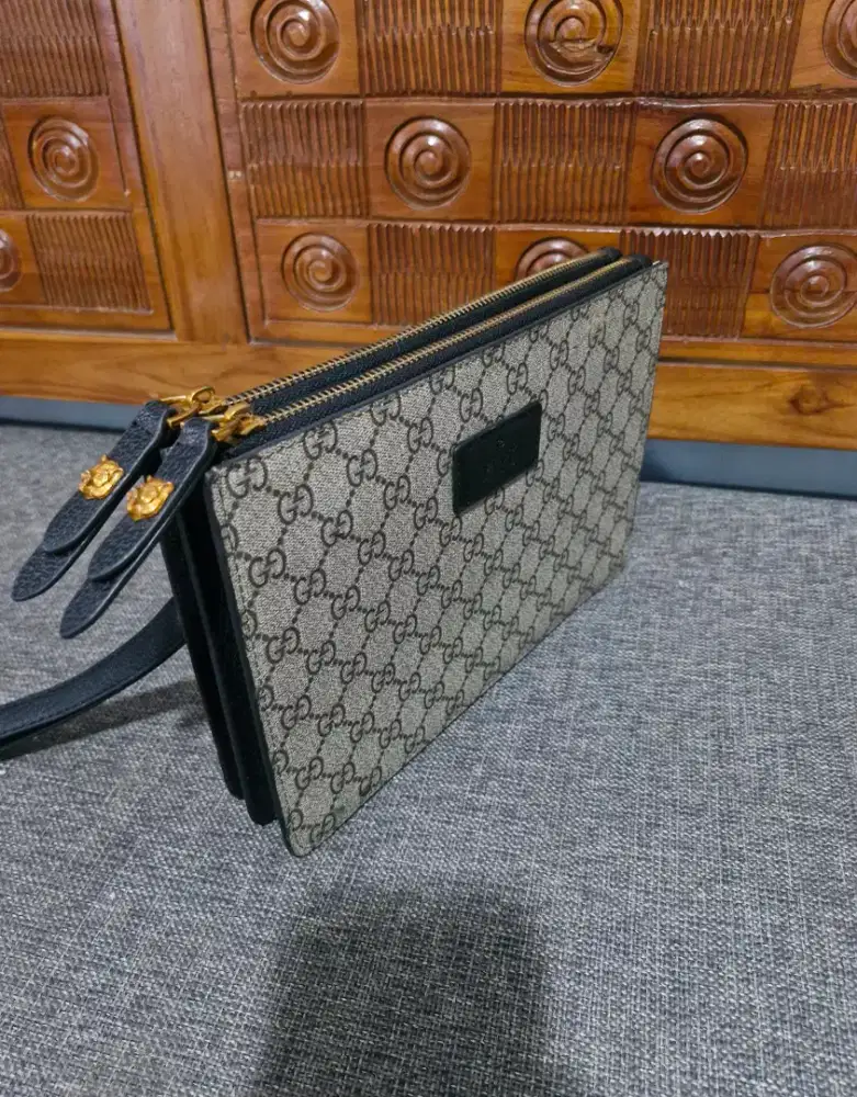 Preloved clutch guc*i monogram kulit double zipper like new