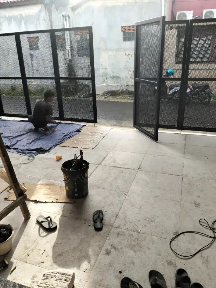 Tukang las kanopi,mezanin,pagar,pintu besi