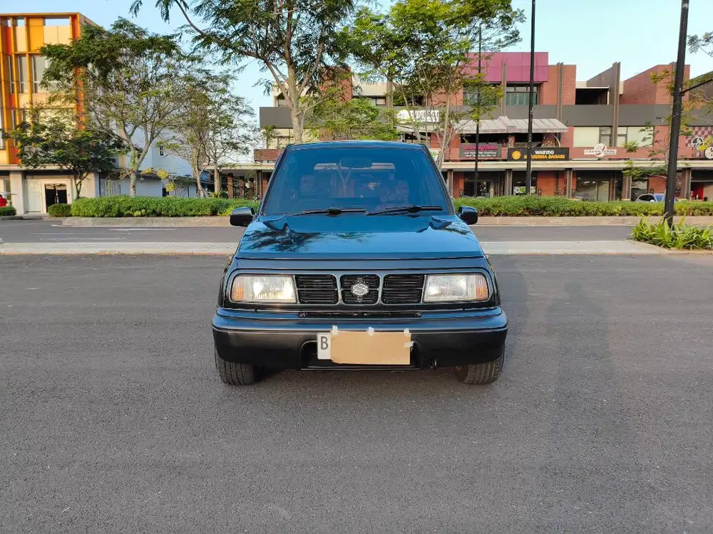 Suzuki sidekick drag-1 MT 1999 abu abu
