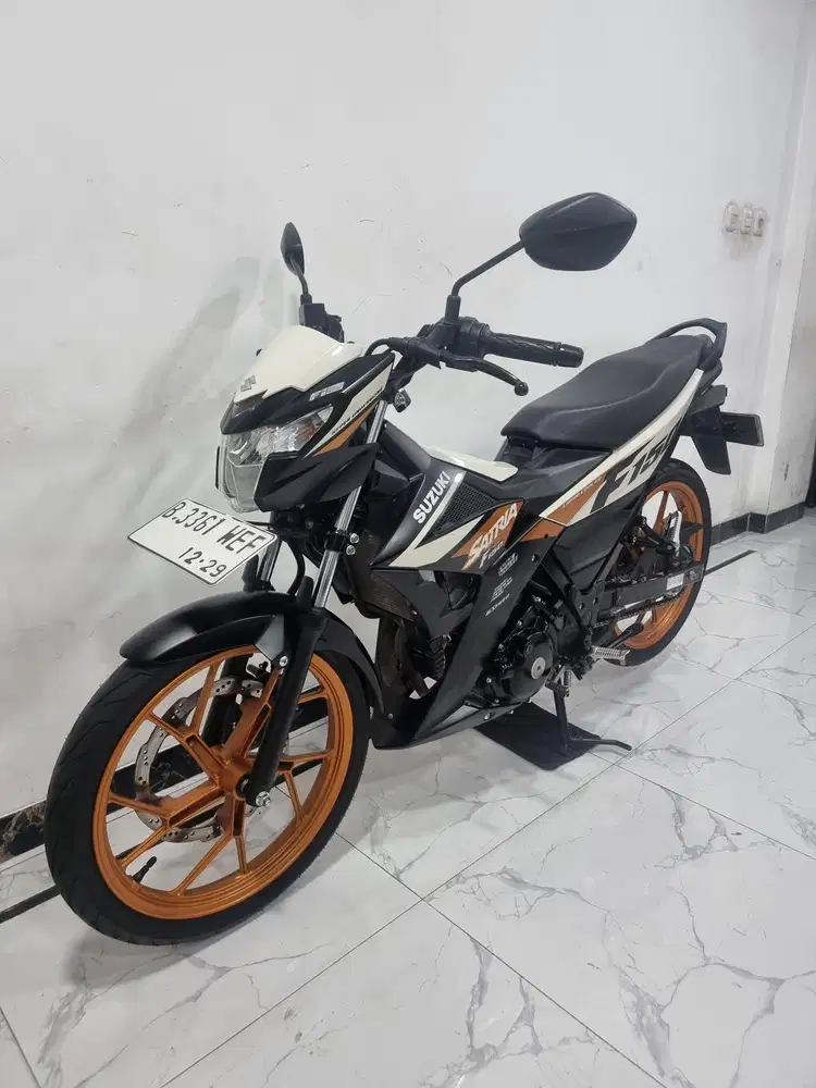 Suzuki Satria F150 Fi 2024 / 2025 bln 12 DIJAMIN SPT Baru Sudah alarm
