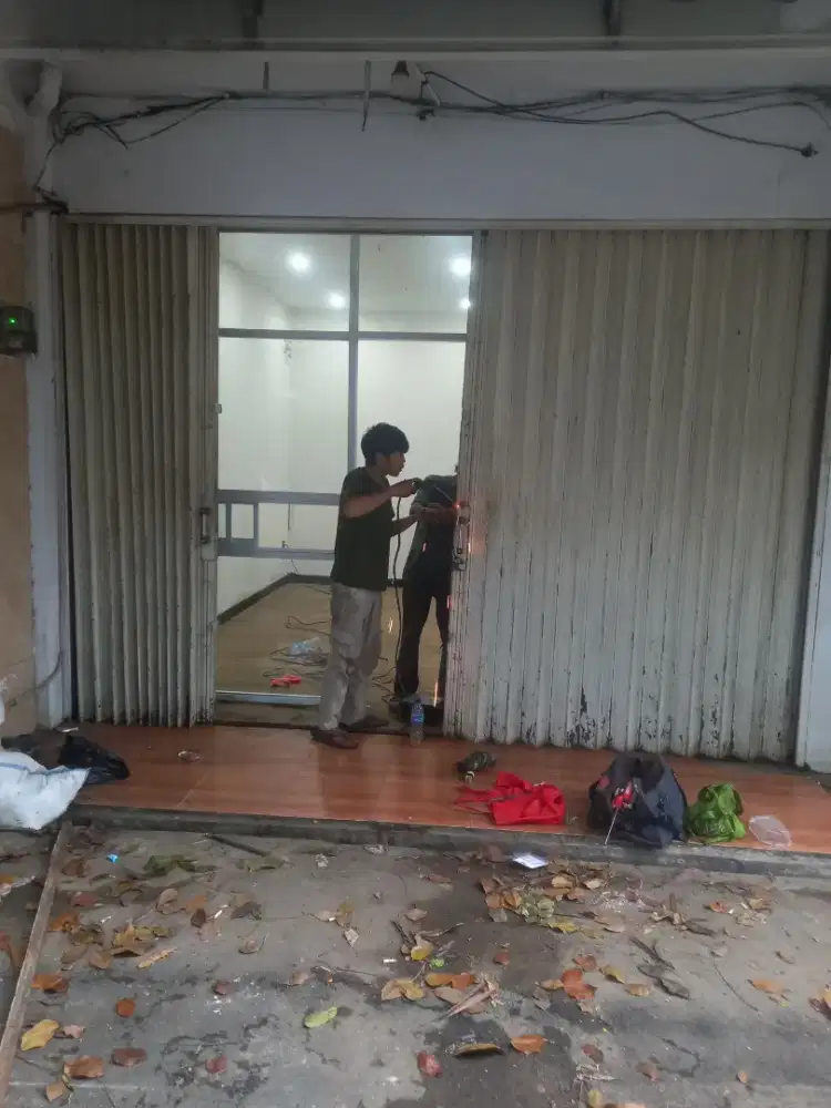 Tukang pasang service rolling door folding gate termurah