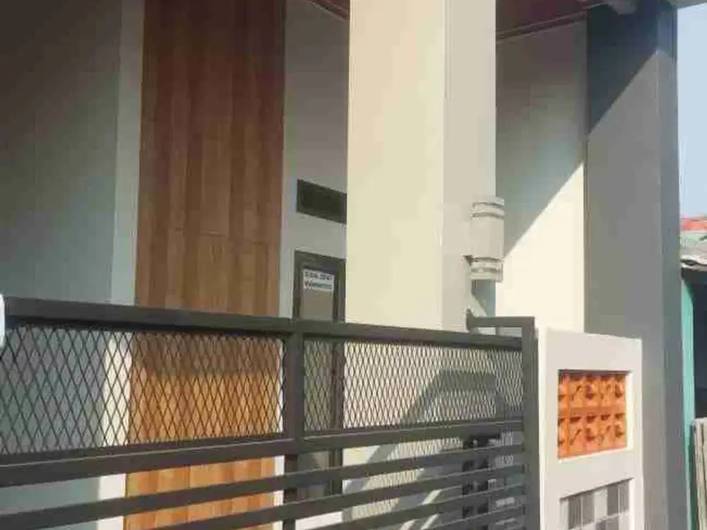 rumah batu renovasi pondok ungu permai blok depan